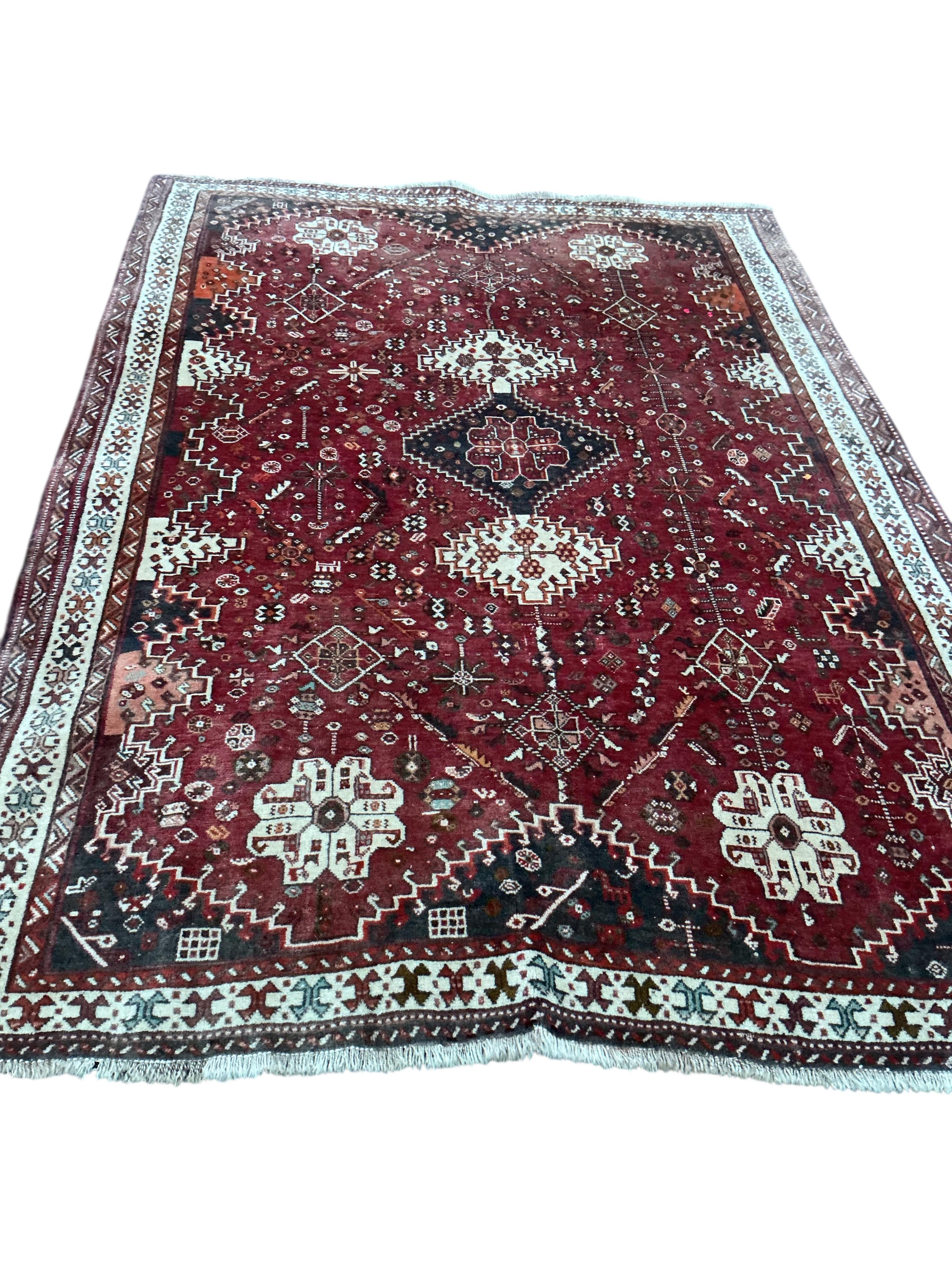 A Hamadan red ground carpet, 255 x 180cm